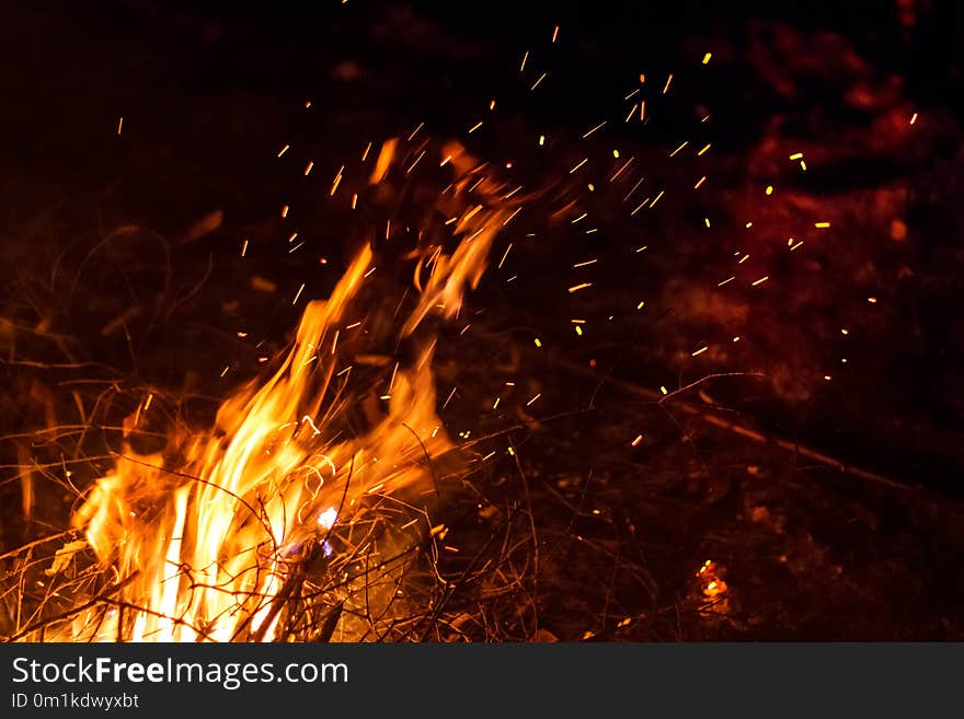 Night bonfire with sparks motion blur. Fire background with copyspace. Night bonfire with sparks motion blur. Fire background with copyspace