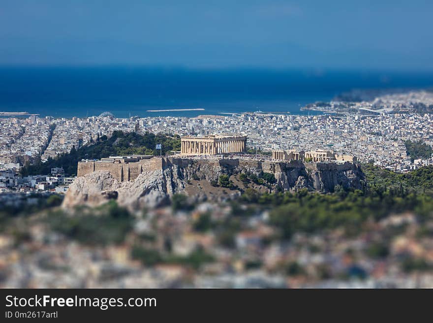 Panoramic aerial view of Acropolis of the city of Athens in Greece, tilt shift, view from Lycabettus hill. Panoramic aerial view of Acropolis of the city of Athens in Greece, tilt shift, view from Lycabettus hill