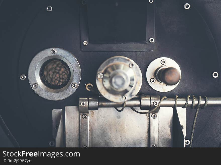 Roasted coffee machine for Coffee beans roasting process, vintage filter image