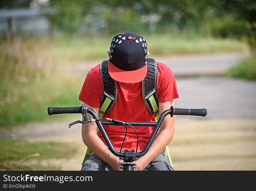 Guy on a bicycle outdoors closeup