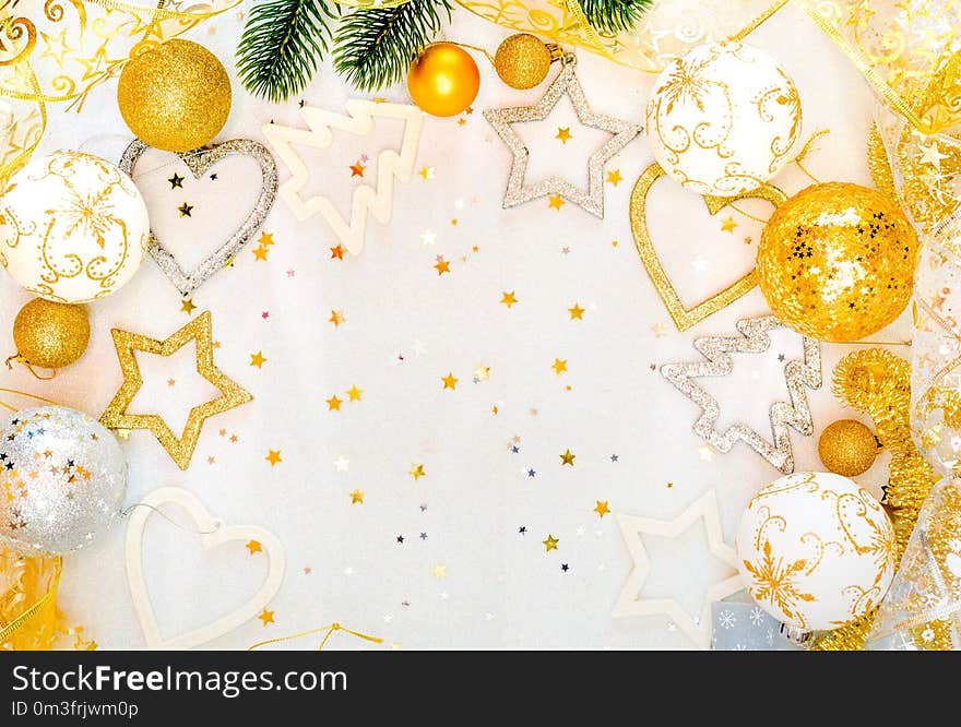 Abstract christmas decor in gold and white caves with christmas toys and decor. Abstract christmas decor in gold and white caves with christmas toys and decor