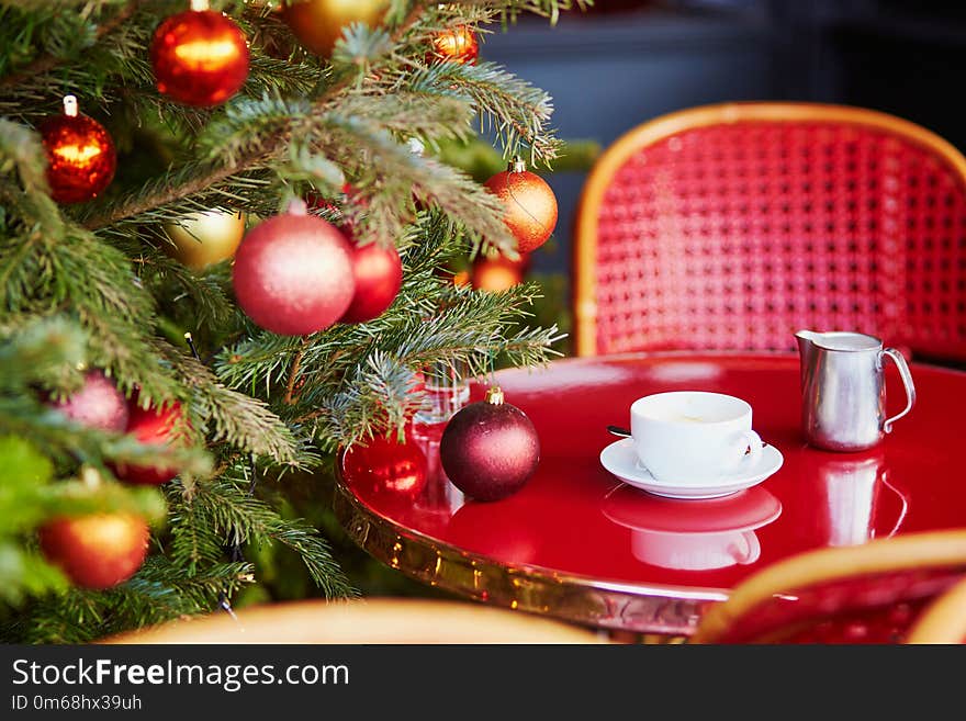 Outdoor Parisian Cafe With Beautiful Christmas Tree