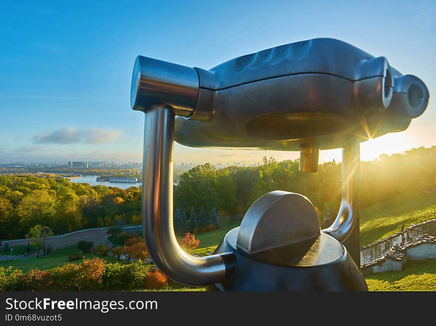 cloudy blue sky over the green park in Kyiv. Landscape shot. Par