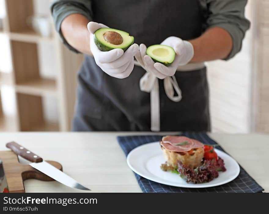 Professional chef preparing dish