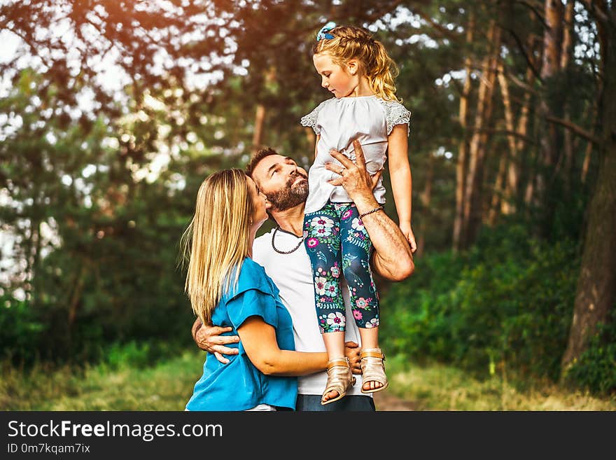 Happy pretty family have fun outdoor