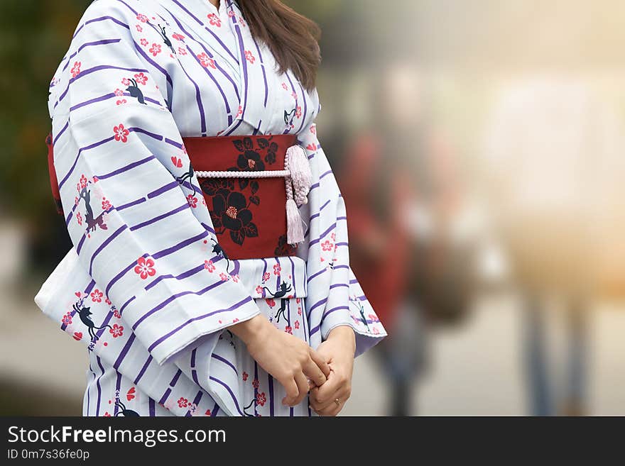 Young Girl Wearing Japanese Kimono Standing In Front Of Sensoji