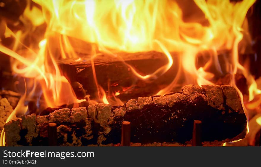 Closeup Image Of Firepalce At House With Burning Logs