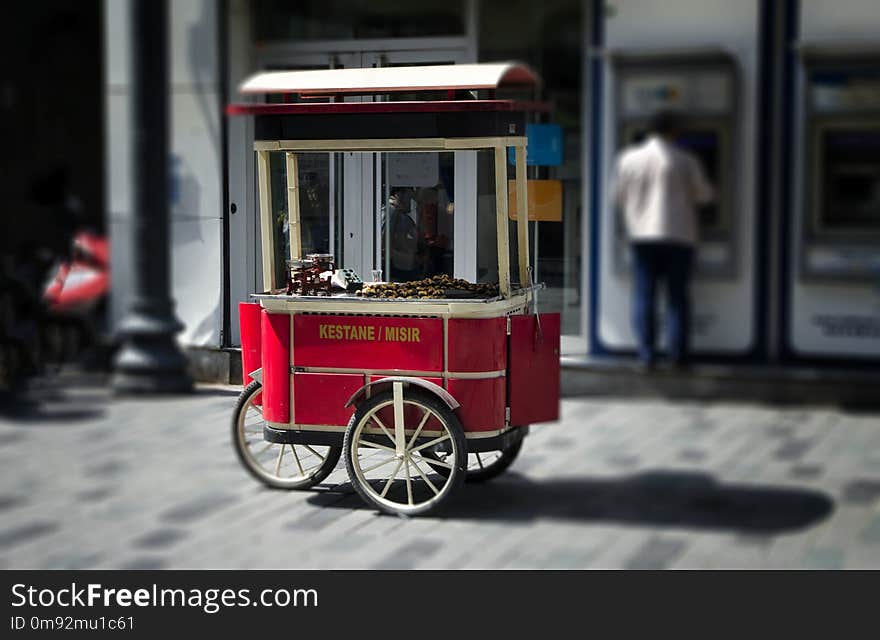 Street cart of fast food with boiled and grilled corn and chestnut