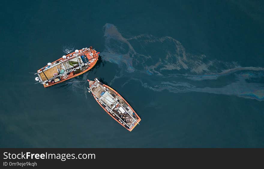 Fishing boats and oil spill