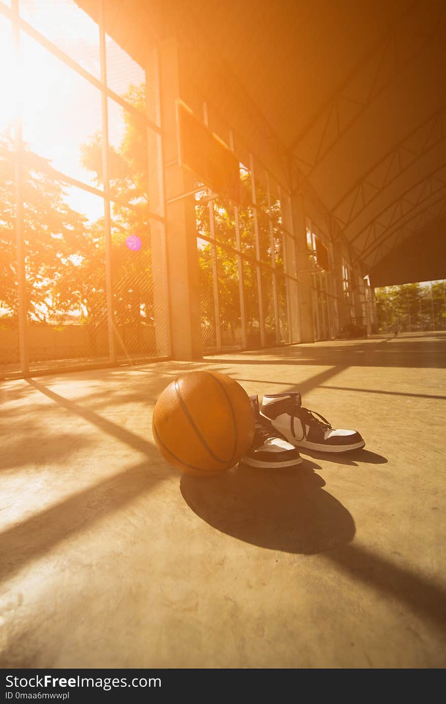 Basketball court with ball and shoes. Basketball court with ball and shoes
