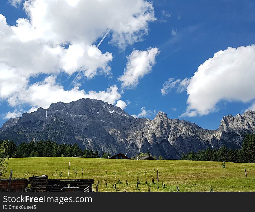 Sky, Mountainous Landforms, Grassland, Mountain Range