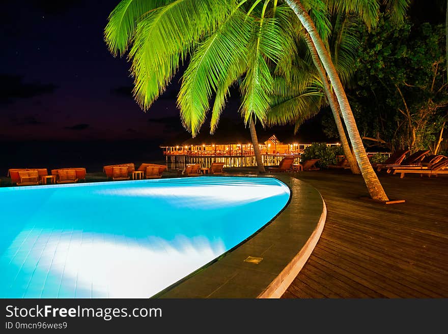 Pool on tropical Maldives island - nature travel background