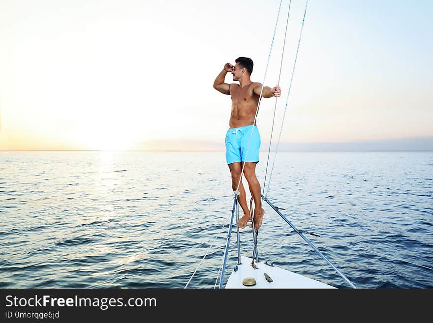 Young wealthy man on yacht