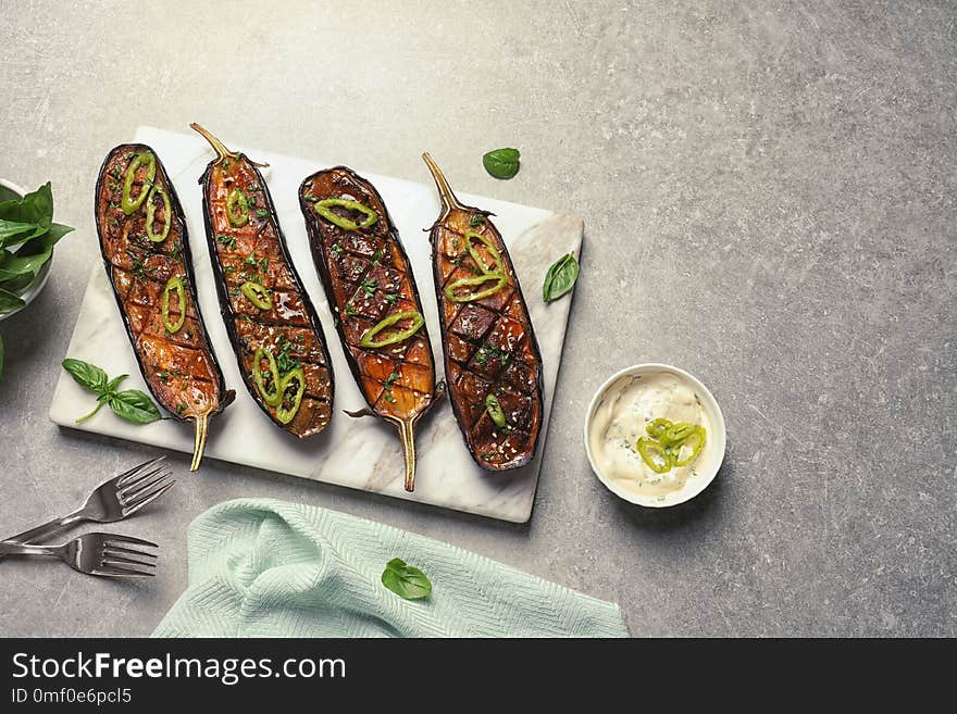 Board With Fried Eggplant Slices On Table