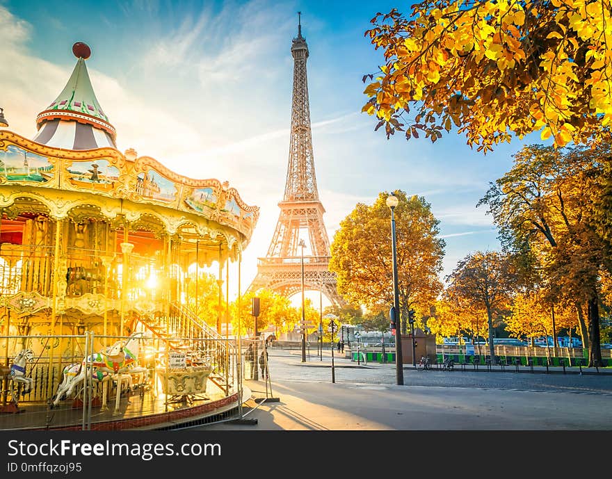 Eiffel Tower with merry go round from Trocadero at fall sunrise, Paris, France, toned. Eiffel Tower with merry go round from Trocadero at fall sunrise, Paris, France, toned