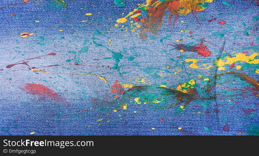 Denim, jeans texture background. Abstract oil paint texture on canvas. Drops of colorful paint on blue background denim, jeans.