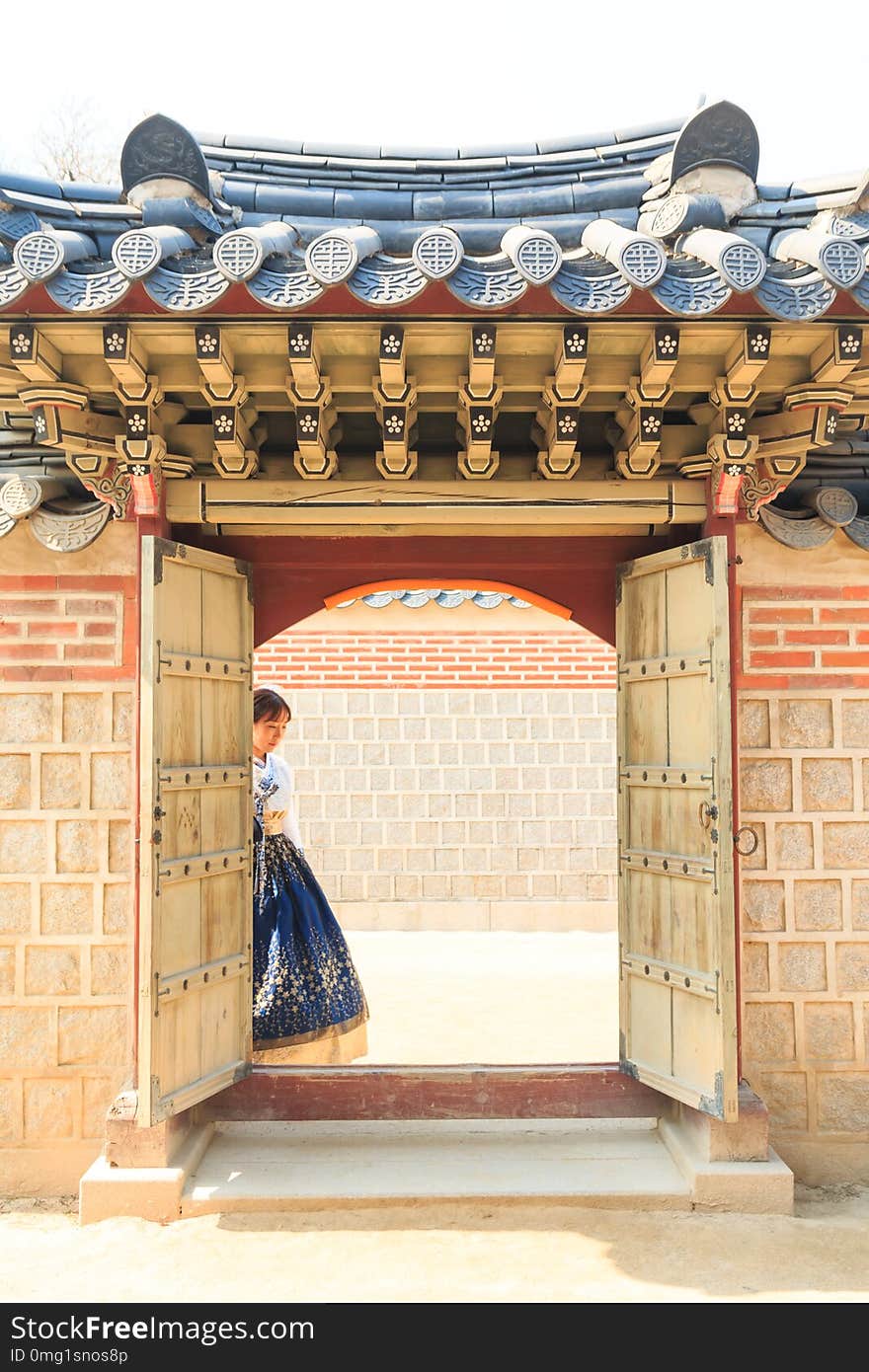 Beautiful Korean woman dressed Hanbok, Korean traditional dress, in Gyeongbokgung Palace, Seoul, South Korea. Beautiful Korean woman dressed Hanbok, Korean traditional dress, in Gyeongbokgung Palace, Seoul, South Korea