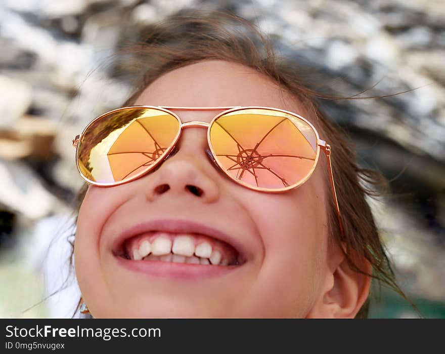 Beautiful young girl in sunglasses with beach umbrella. rerlection Holidays, travel, vacation and happiness concept. Beautiful young girl in sunglasses with beach umbrella. rerlection Holidays, travel, vacation and happiness concept.