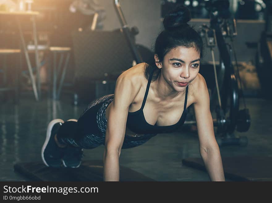 Asian Woman Intend Exercise At Gym For Healthy.