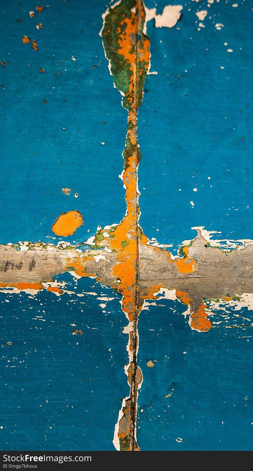 Paint is scraped on an iron wall, background, texture. Paint is scraped on an iron wall, background, texture