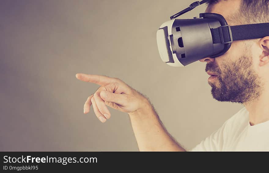 Adult man wearing vr goggles