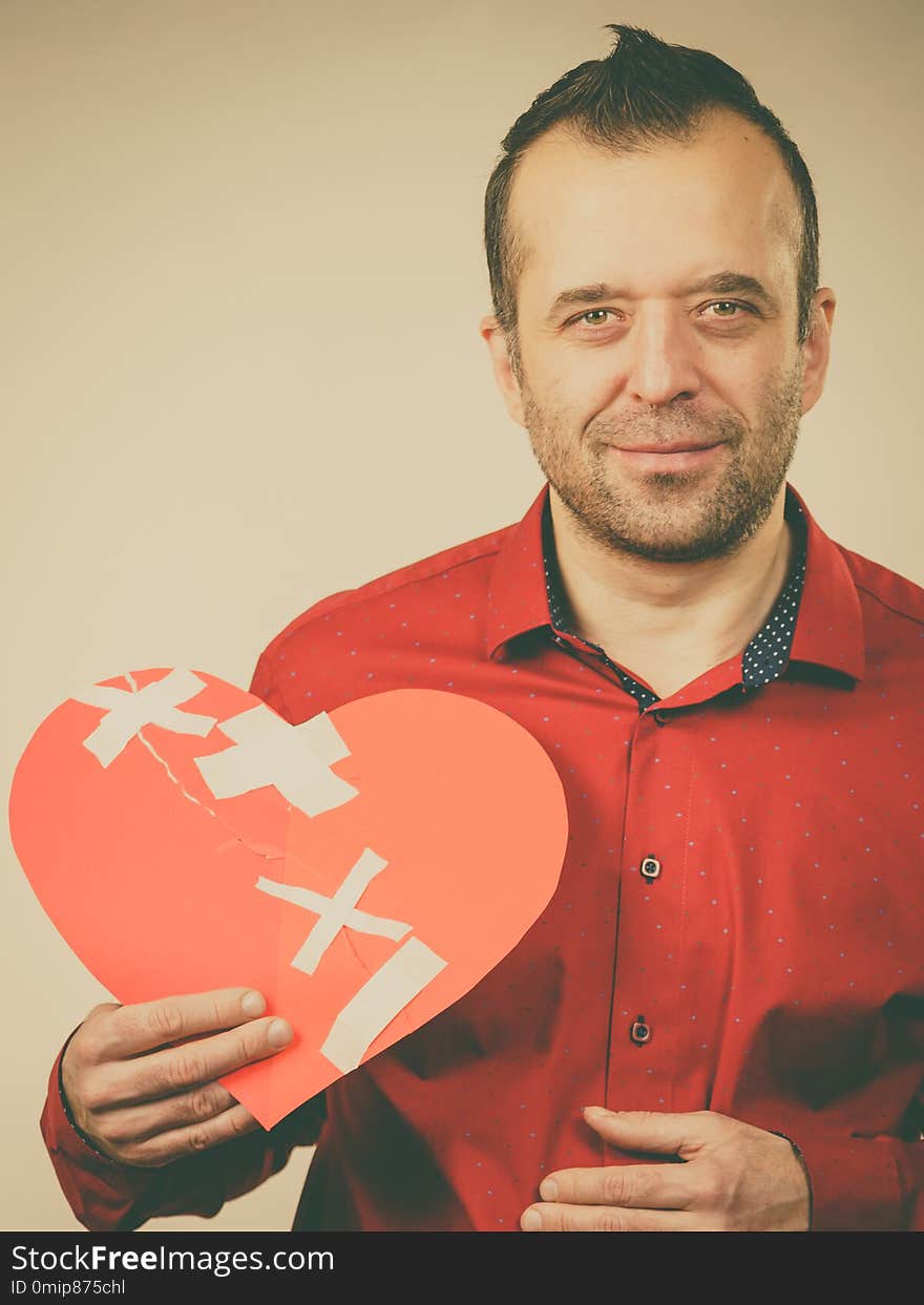 Smiling man with healed heart.