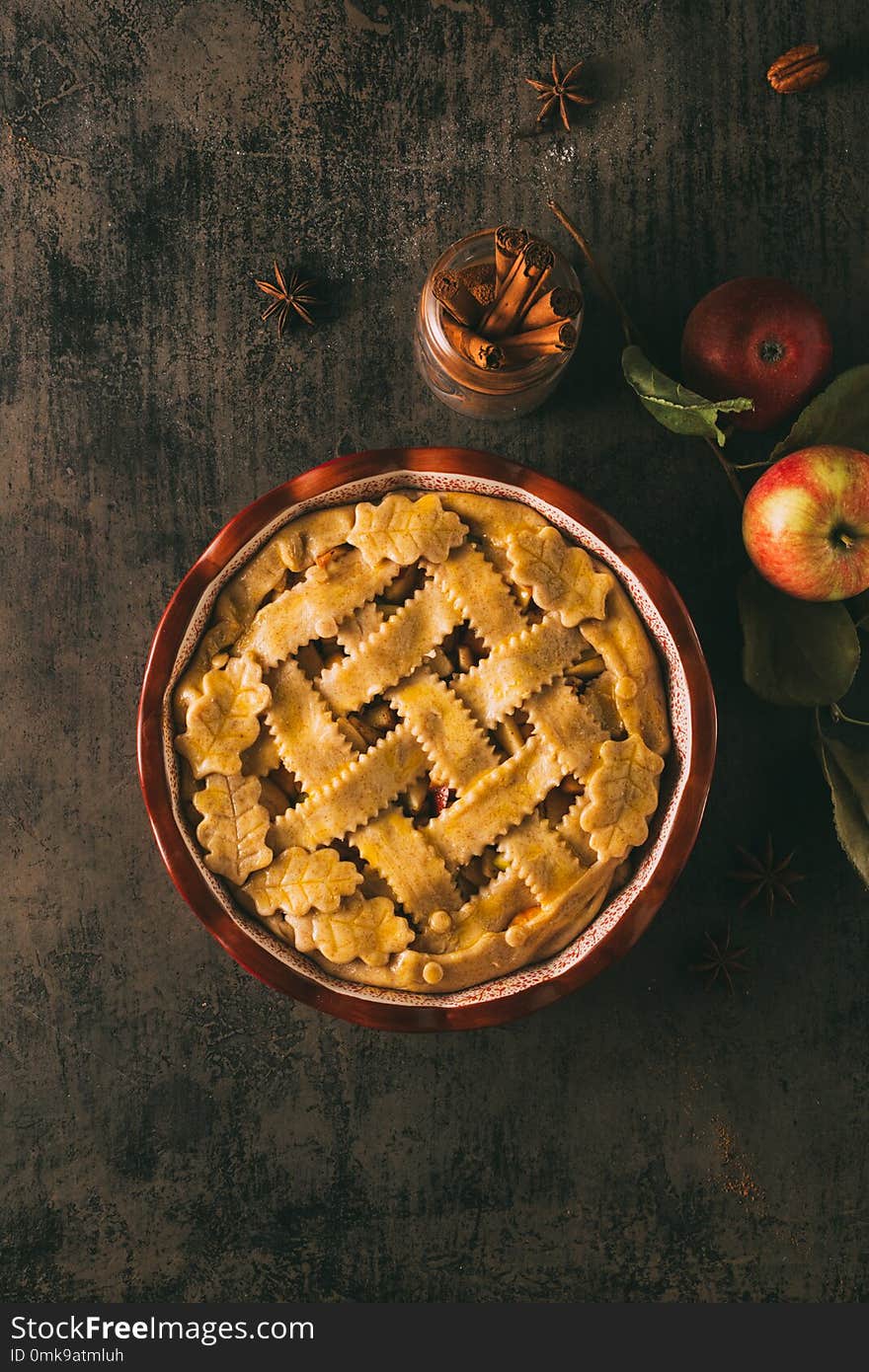 Homemade Apple pie with cinnamon and pecan. Prepared for baking.