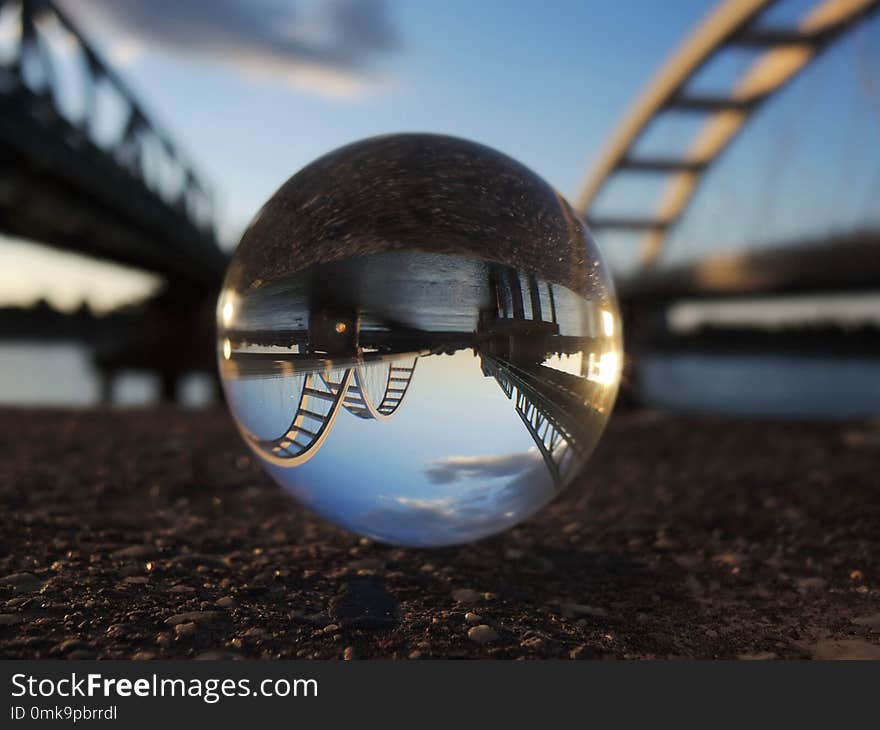 Two bridges on the river Danube in Novi Sad, Serbia reflection in crystal ball. Two bridges on the river Danube in Novi Sad, Serbia reflection in crystal ball