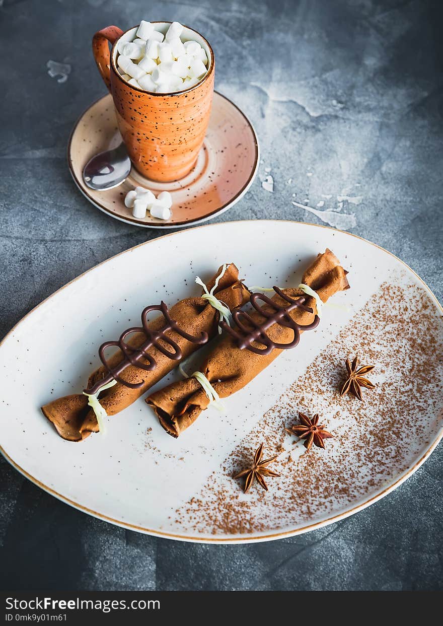 Chocolate Pancake With Cinnamon, Anise And Cup Of Coffee With Marshmallow. Dessert And Coffee