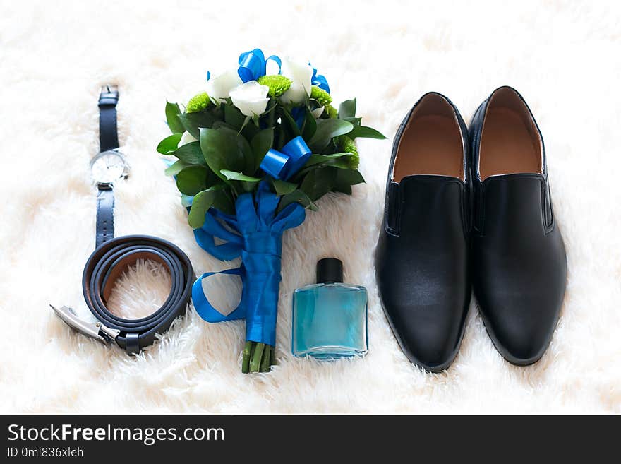 Objects of groom`s clothes on a white background.