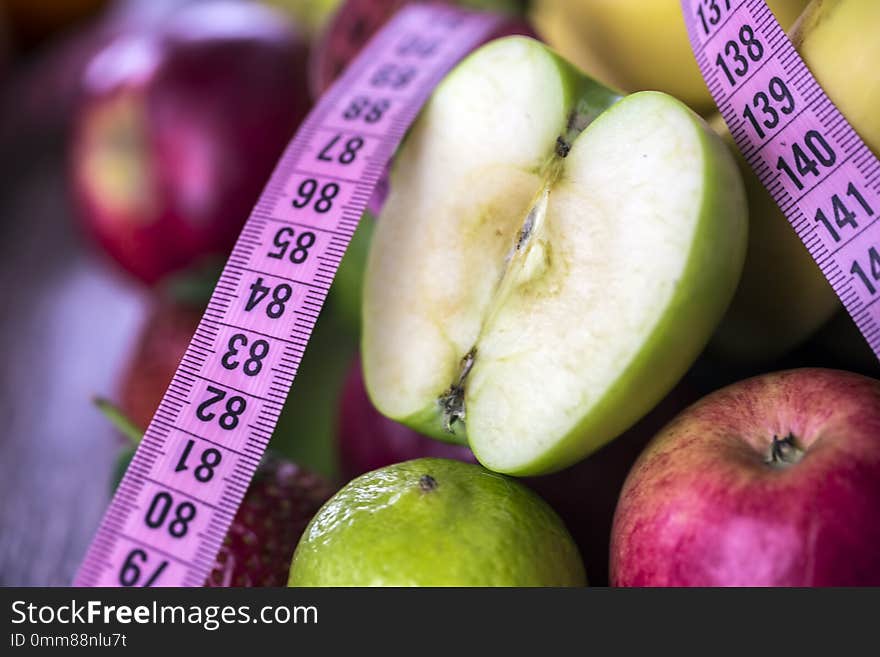 Mixed fresh organic fruits on the background.