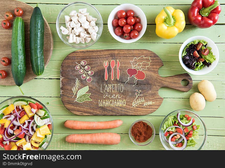 Cutting board and fresh vegetables