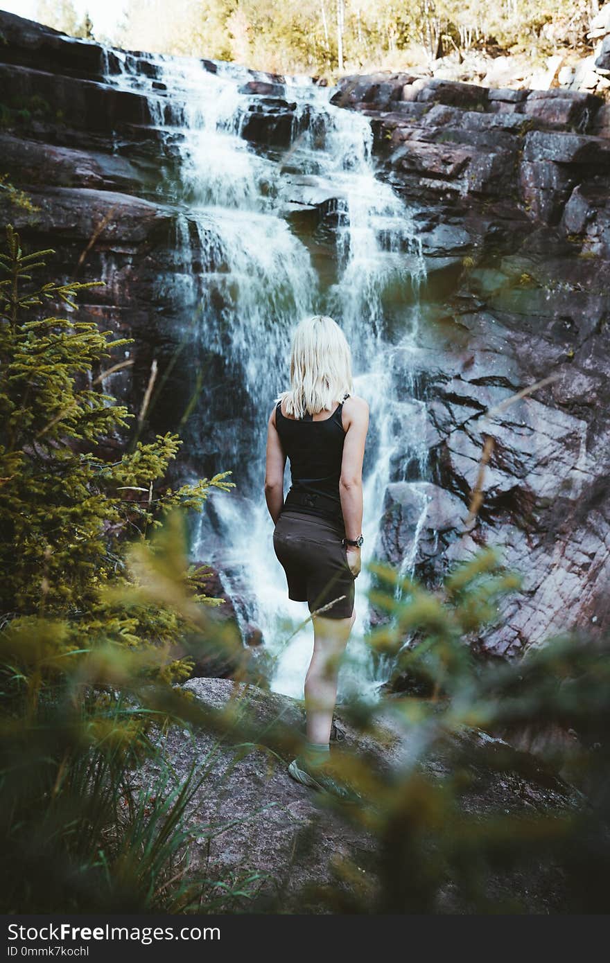 A girl hiking at the Solbergelva river in south Norway