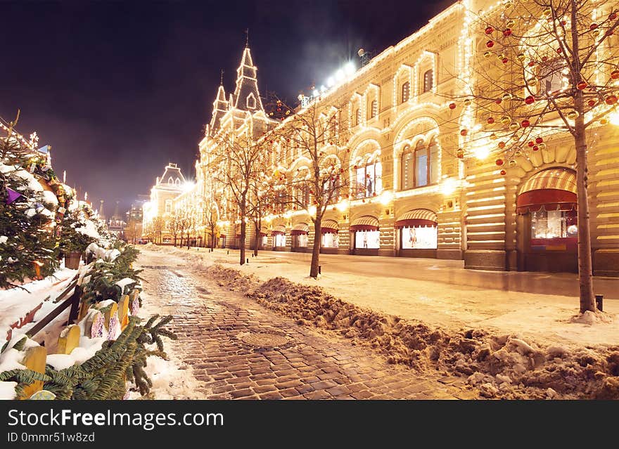 Winter Moscow At Night. Festive Decorations On Red Square Near GUM. City Is Illuminated Glowing And Shining Lights