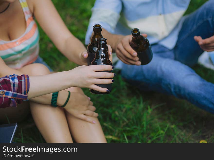 Group of friends having rest at park