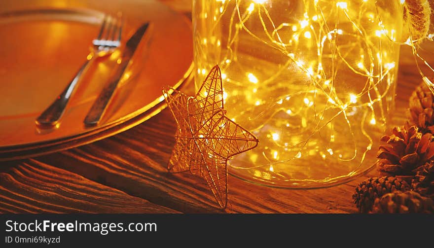 Plate and cutlery with Christmas decoration