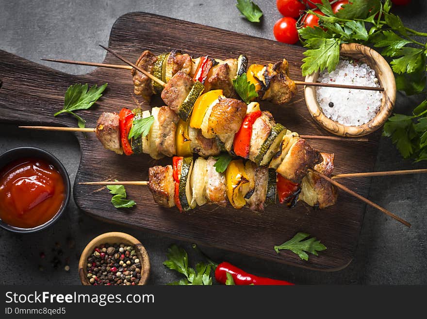 Grilled Shish Kebab With Vegetables On Black.