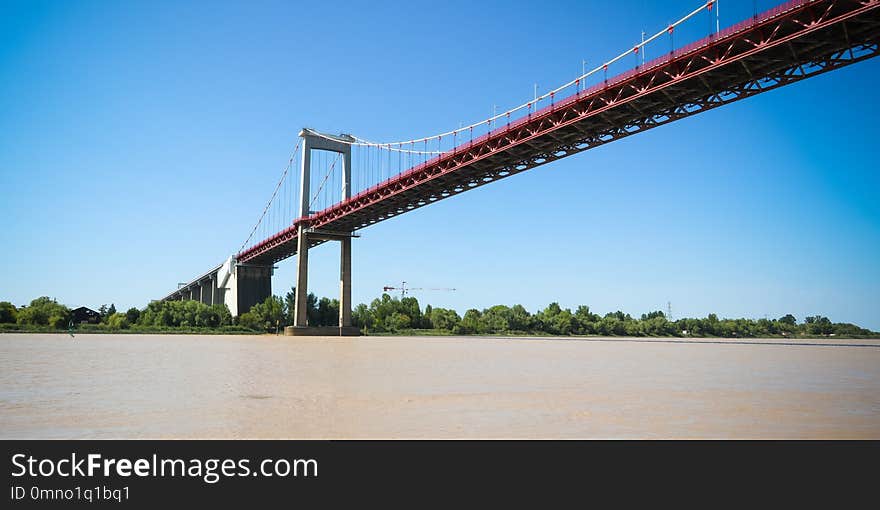 The pont d`Aquitaine is suspension bridge above the river Garonne in France. The pont d`Aquitaine is suspension bridge above the river Garonne in France