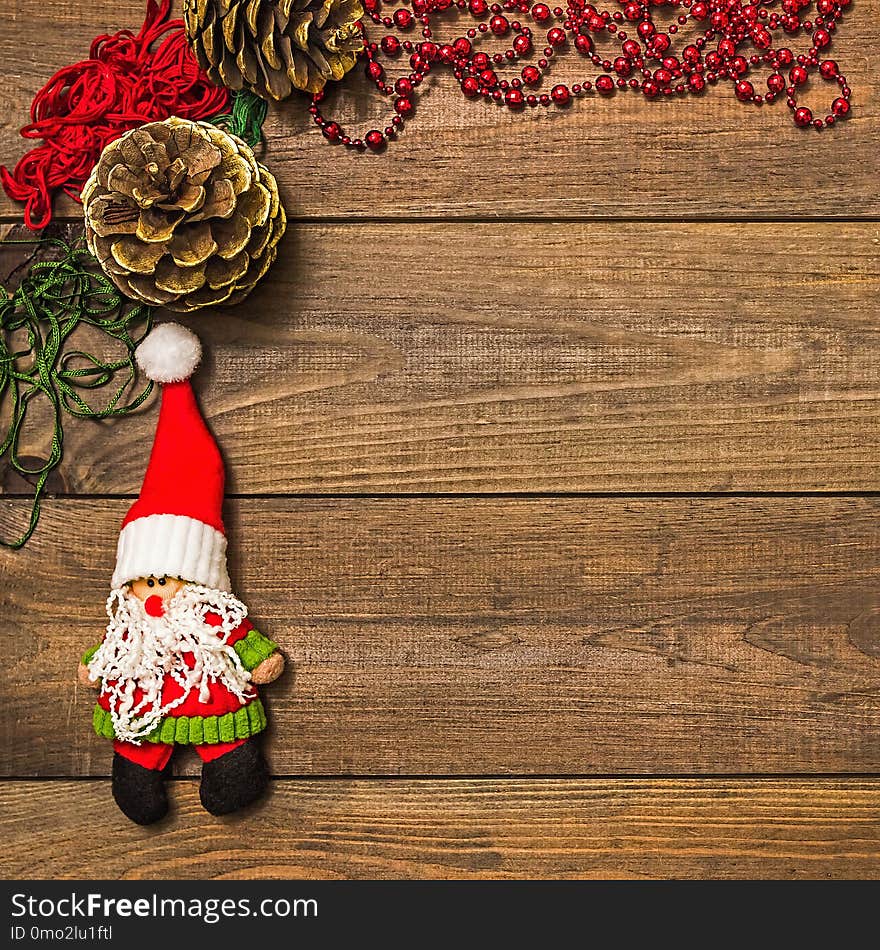 Christmas decorations on a dark wooden table.