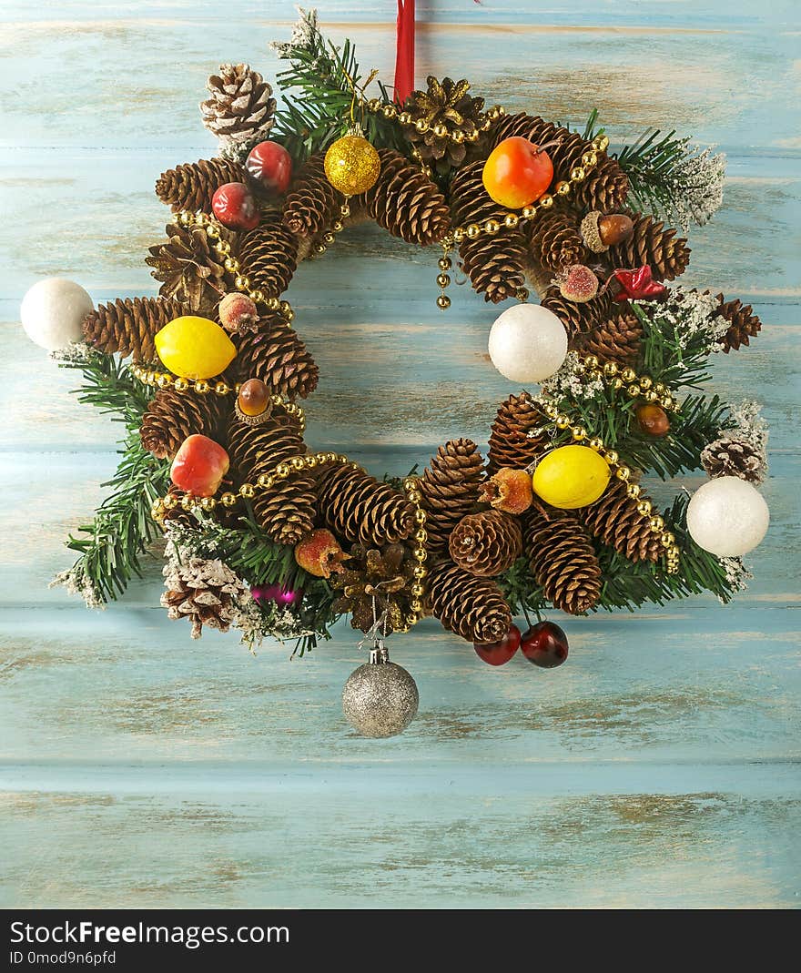 Christmas wreath on blue background