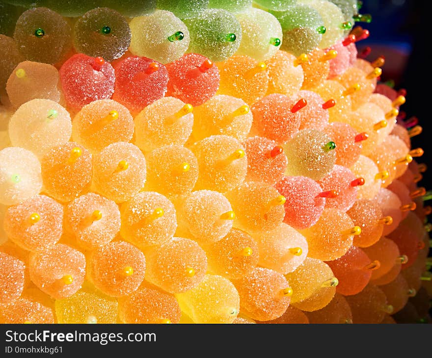 Fruit marmalade on sticks in the store