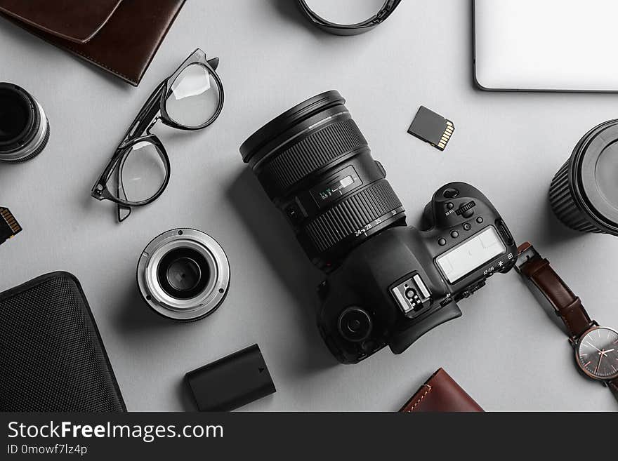 Flat lay composition with professional photographer equipment