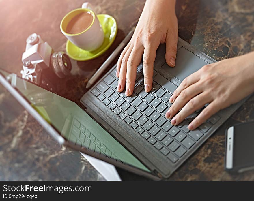 Laptop computer , coffee , old fashion film camera