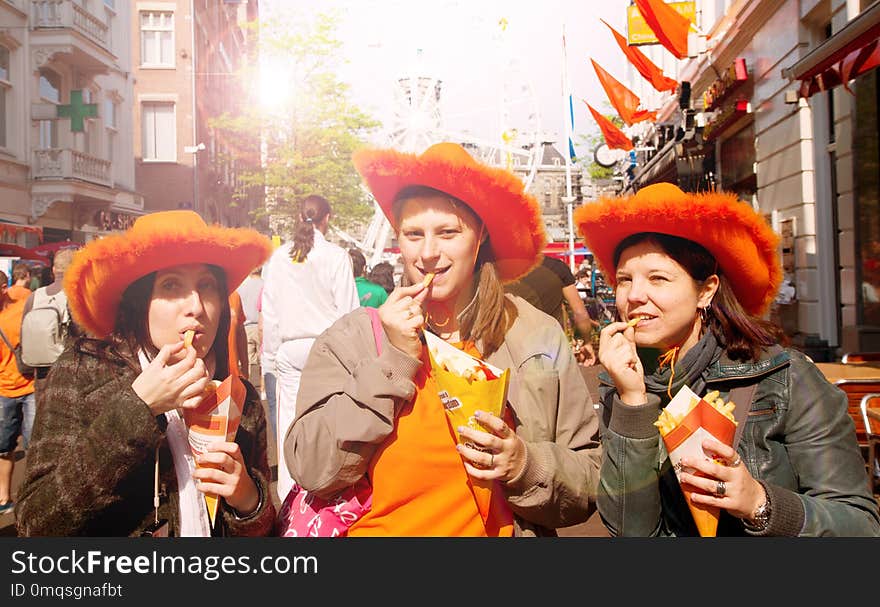 Turist in Amsterdam celebrate Queen`s Day. Turist in Amsterdam celebrate Queen`s Day