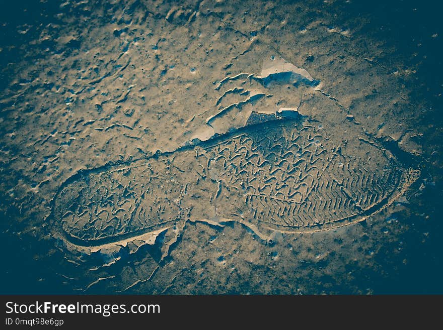 Footstep pattern seen on a concrete background. Footstep pattern seen on a concrete background