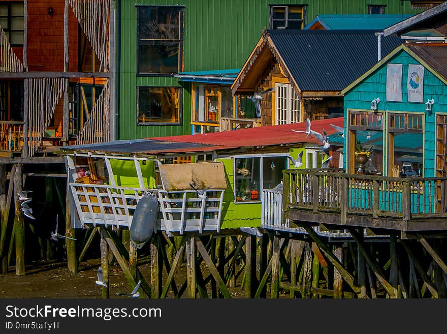 Beautiful coorful houses on stilts palafitos in Castro, Chiloe Island