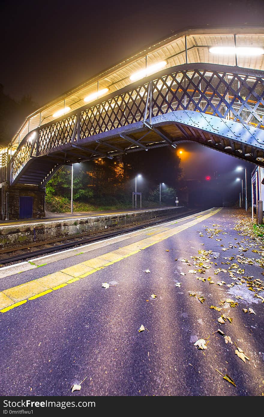 London Road Guildford train station platform at night Guildford Surrey England Europe. London Road Guildford train station platform at night Guildford Surrey England Europe