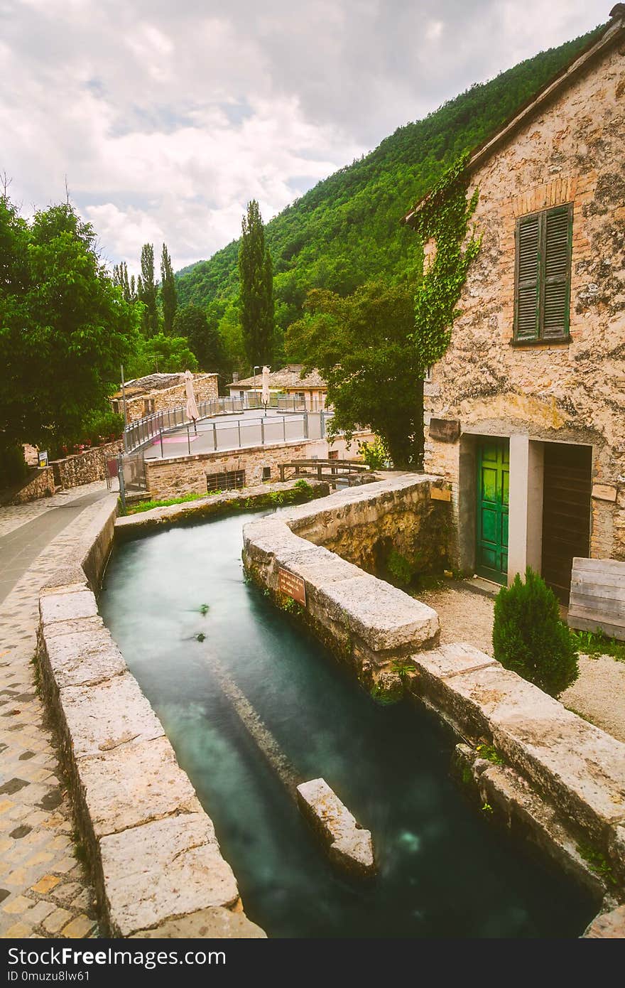 Rasiglia is a river-side town in Umbria, Italy. It`s unique in that rivers flow directly through the entire town, packed with lovely bridges and small footpaths. One of the many features is quotes that accompany their many fountains, all in celebration of water. Although busier in early-summer, as fall approaches, the town is quiet during the late-afternoon. Rasiglia is a river-side town in Umbria, Italy. It`s unique in that rivers flow directly through the entire town, packed with lovely bridges and small footpaths. One of the many features is quotes that accompany their many fountains, all in celebration of water. Although busier in early-summer, as fall approaches, the town is quiet during the late-afternoon.