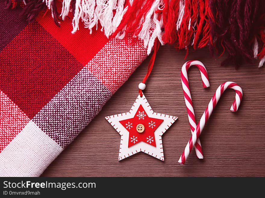 Christmas candy and red plaid. Christmas new year background for design.