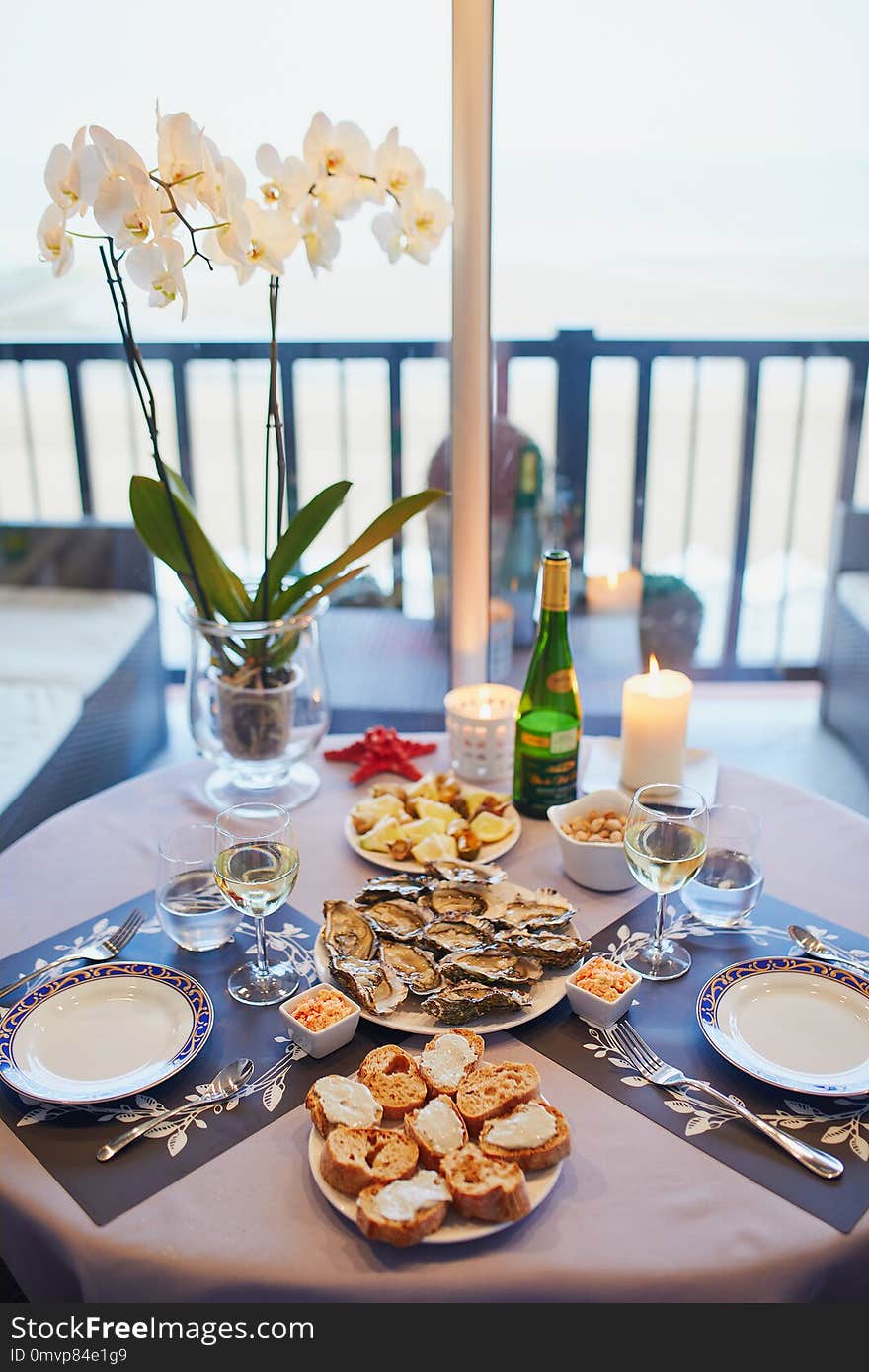 Delicious lunch with oysters served for two at home or in restaurant